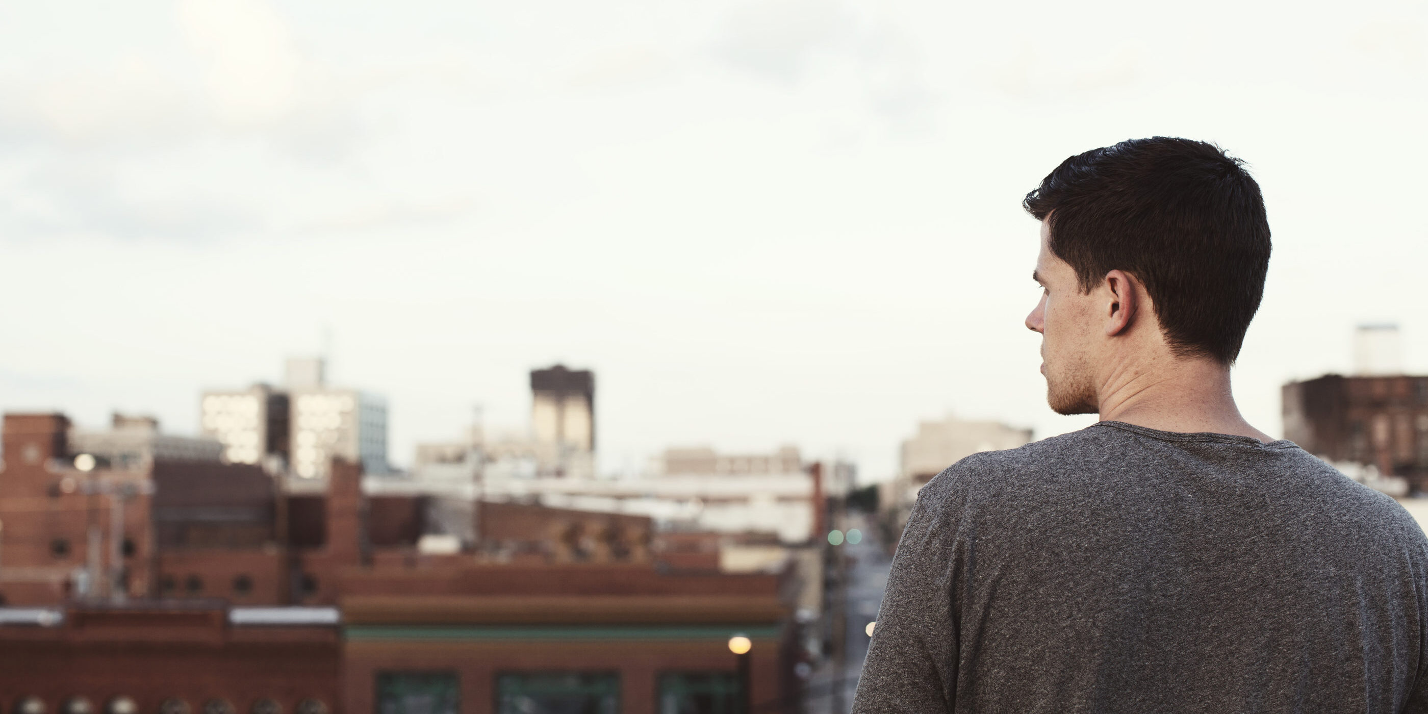 Teen (male) looking over city